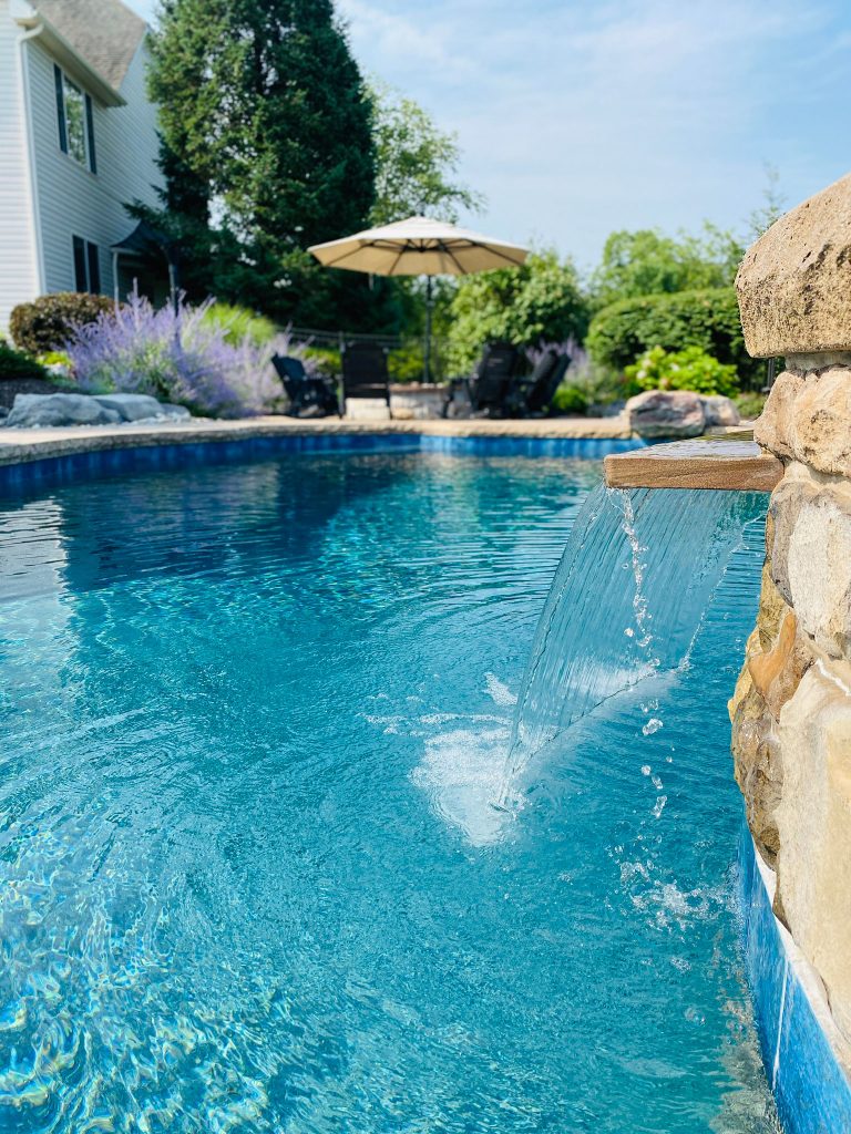 Waterfall feature into pool