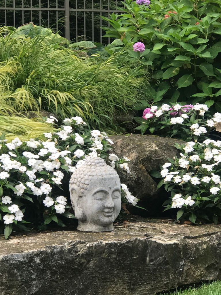 Buddha head in garden